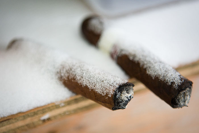 Cigars left in a COVERED area were not spared the snow.