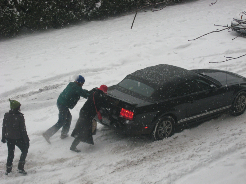 Rather than help, Damon stayed warm and grabbed his camera on First Hill.