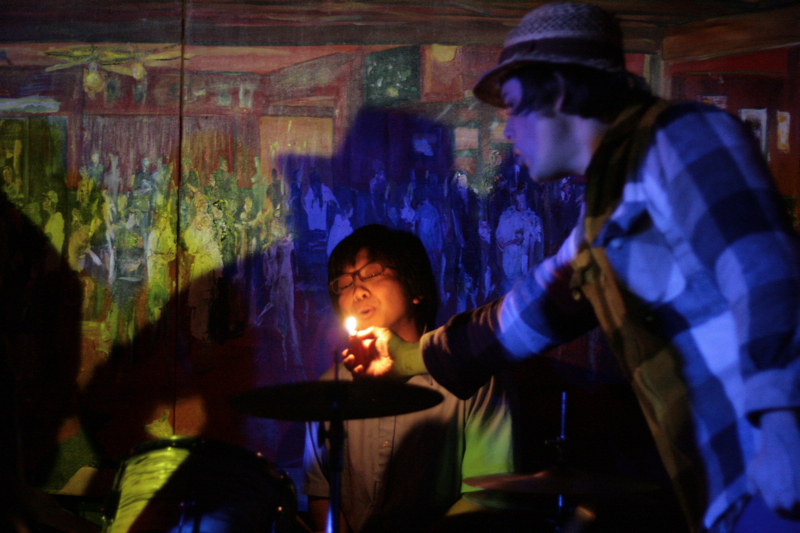 Andy Fitts (Banyans) shines a light on Tomo Nakayama (Grand Hallway) during The Maldives' set.