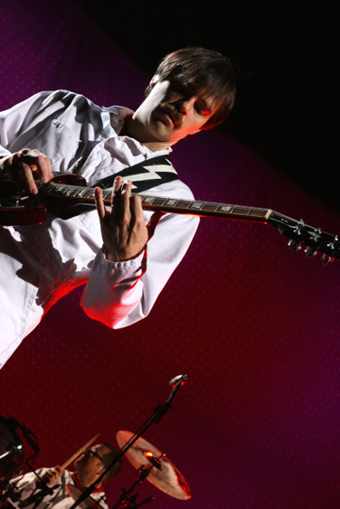 A handful of contest winners performed a pair of songs with Weezer,