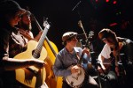 The Tall Boys String Band provides warm-up music.