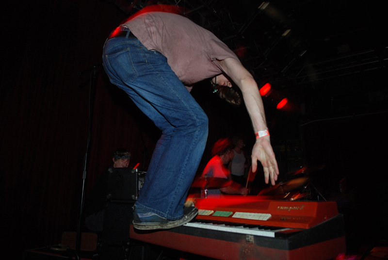 Nathan Dr. Sound Schmeck of Thee Emergency mounts his keyboard.