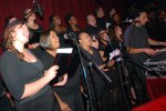 The Total Experience Gospel Choir belts out harmonies.