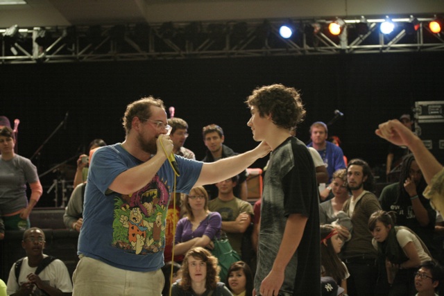 Bumbershoot: Three-Sentence Review of Dan Deacon: So very true. I was working security and saw the show from the top of the stairs. I was expecting hipster crap, but I had no idea how utterly fantastic the crowd would be! The human tunnel was amazing. Watching it form around the Ex-Hall from above was a thing of beauty. - Submitted by Lori