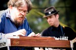 Jon Rauhouse plays pedal steel behind Neko Case.