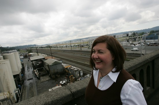 Kathy Nyland, chair of the neighborhood merchants association, calls the compromise idea from Richard Conlin a land grab.