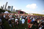 The Chicago skyline looms over concert-goers at Lollapalooza, August 1, in Chicago, Illinois.