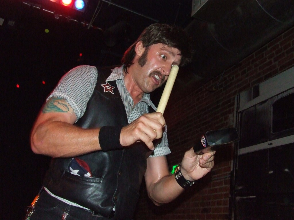 Darryl Lee Donald (J.R. Reed) gets crazy with the cowbell.
