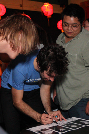 Jesse Laz signs some autographs in the surprisingly chill side room, where band members mingled alongside fans.