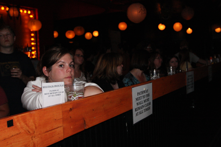 Waiting for Rooney inside the bar.