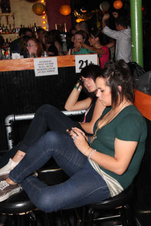 Waiting for Rooney outside the bar.