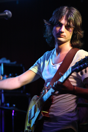 Taylor Locke, RooneyaE™s guitarist and harmony vocalist, looks relaxed as always playing during MondayaE™s show at Chop Suey.