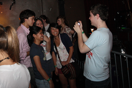 The Morning Benders frontman Chris Chu gets some groupie love after the band's set.