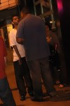 12:31: After having his ID taken by the bouncer at Earl's, this guy (white shirt) was more active in his retrieval methods than the kid earlier. I admire his idiocy, running his mouth despite being outsized by even the female bouncer. But, when the cops came, he was nowhere to be found.