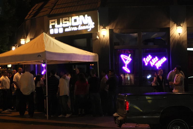 12:42: On a tip from Mike I detoured from the Ave to check out Fusion Ultra Lounge, which turned out to be hosting Latin Night. It was packed, just like he'd said, and DJ Delicious was spinning great tunes that I could hear from across the street.