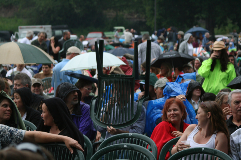 Mike Seely: There I sat, getting dumped on sans ballcap near the stage at the winery in Woodinville, having just weathered word of the Sonics' imminent departure and Chateau Ste. Michelle's inane will call system, where a runner must fetch every ticket from some secret vault a football field away from the entrance. I needed consolation. I needed wisdom. I needed my Dad.