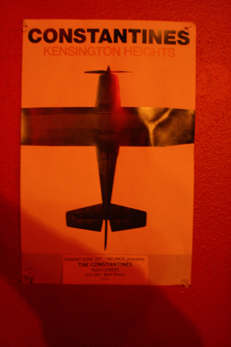 A Constantines Kensington Heights gig poster hangs in the hall at Neumos.
