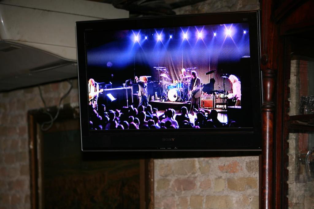 REM at Stubb's... This was as close as our photographer got. RFT music editor Annie Zaleski got in, though, and blogged about it.