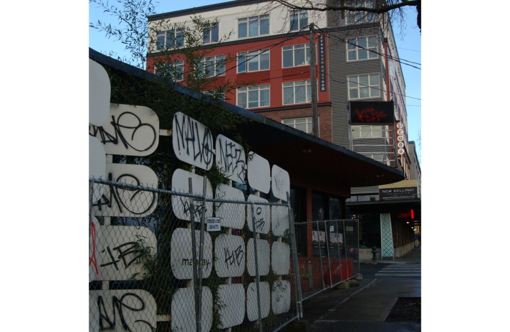 On Pine Street, Man Ray has closed and will soon be demolished--perhaps for another condo like the Press (to rear).