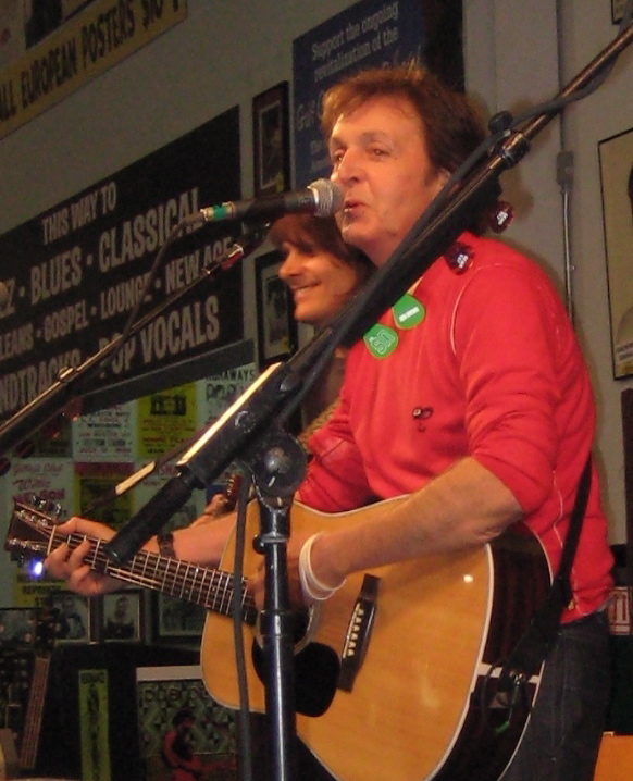 Paul McCartney; Amoeba Records, Hollywood, CA.; June 27: Ok, I got in to see Paul at the free Amoeba in-store show. The crowd was a buzz wondering if he would play any Beatles songs or mostly stuff off the new album. Which we hear is good, but good enough to sleep on a sidewalk for three-days (which is what many people in the crowd did)? I wasn't sure. When he opened with a Beatles numberaE”aEœDrive My CaraEaE” the crowd flipped. He didn't disappoint, he gave them what they wanted, and so the crowd Na-na-na'ed to aEœHey JudeaE, pounded their fists in the air to aEœBack in the USSRaE, bopped their heads to aEœGet BackaE, and aEœBlackbirdaE and stood solemnly still holding lighters above their heads to aEœLet It BeaE. At one point someone in the crowd yelled a request for Helter Skelter. No, now, that's John's, said Sir Paul. But, let's do one for John. One for John and Linda. He played one of his own, aEœHere TodayaE. (Linda Immediato)