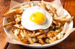 Small plates include poutine and candied bacon, and you can add an over-easy duck egg to your Painted Hills burger.