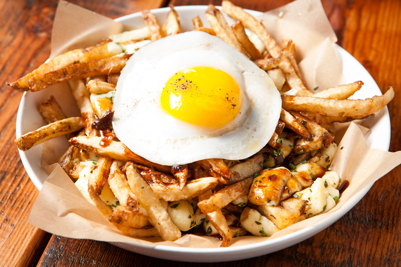Small plates include poutine and candied bacon, and you can add an over-easy duck egg to your Painted Hills burger.