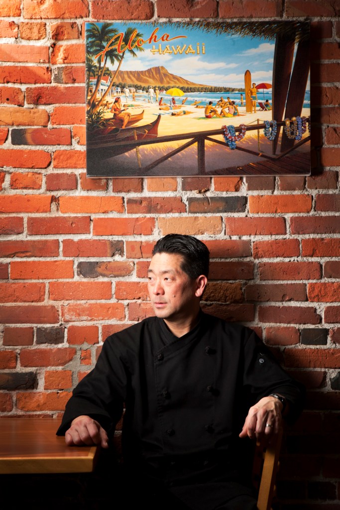 Right: Owner Dean Shinagawa sits in his lightly adorned Everett restraurant. Left, from top: loco moco; Spam musubi; ramen.