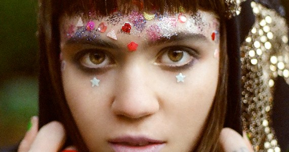 Grimes is playing a free show at the Paramount tonight, which by