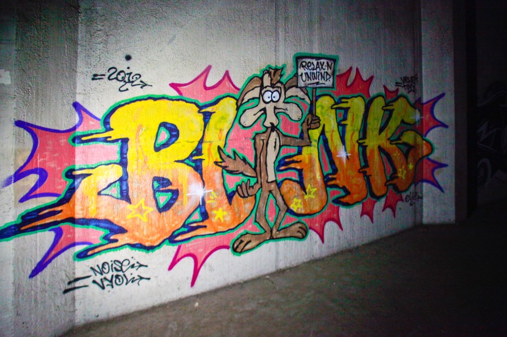 Fone is slouched back in a chair at Rancho Bravo Tacos on