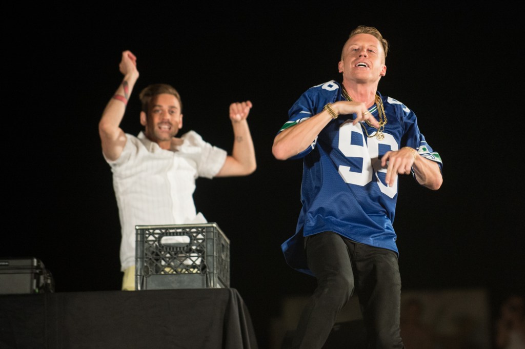 Macklemore performs atop Dick's Burgers in Seattle, WA for his upcoming music video White Walls on July 24, 2013.