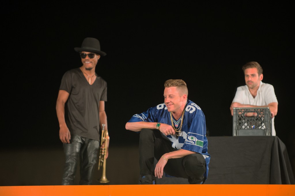 Macklemore performs atop Dick's Burgers in Seattle, WA for his upcoming music video White Walls on July 24, 2013.