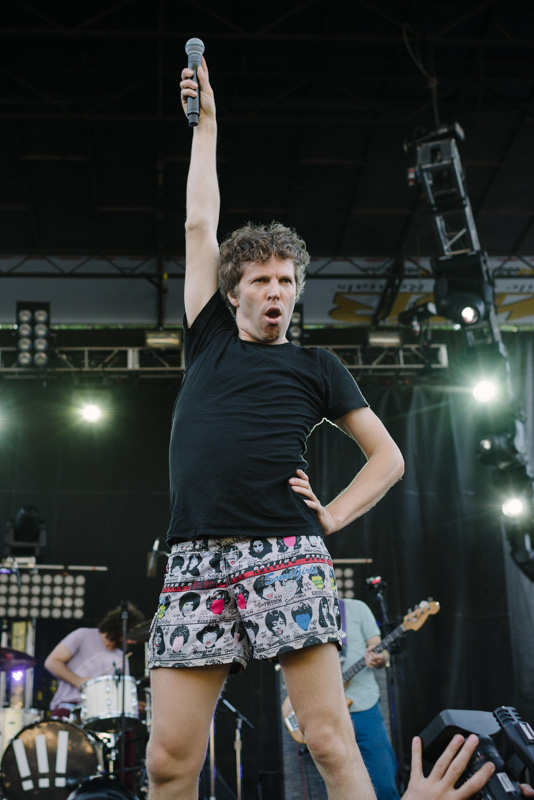 Nic Offer of !!! (Chk Chk Chk) caused a rambunctious dance party at the Tune In Stage, popping hips, jumping to the crowd, and lifting his shorts for the press.