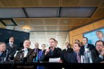 (Photo credit: Daniel Berman) Jamen Shively speaks at the late-May Diego Pellicer press conference, flanked by Vicente Fox (left) and John Davis.