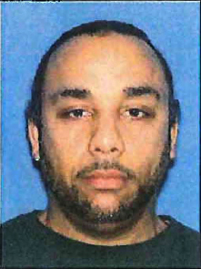 Three Bellevue officers fired 21 rounds at Smith. Below: Russell Smith, left, and his brother Rydell were the targets of the raid.