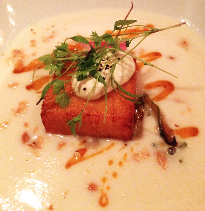 Celeriac soup with a chickpea fritter and vadouvan cream.