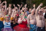 People from all around gather for the event, lining the shores of the tiny park five deep.