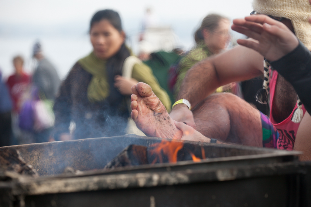 Once the fun was over, swimmers tried numerous methods to warm up, including this less than conventional tactic.