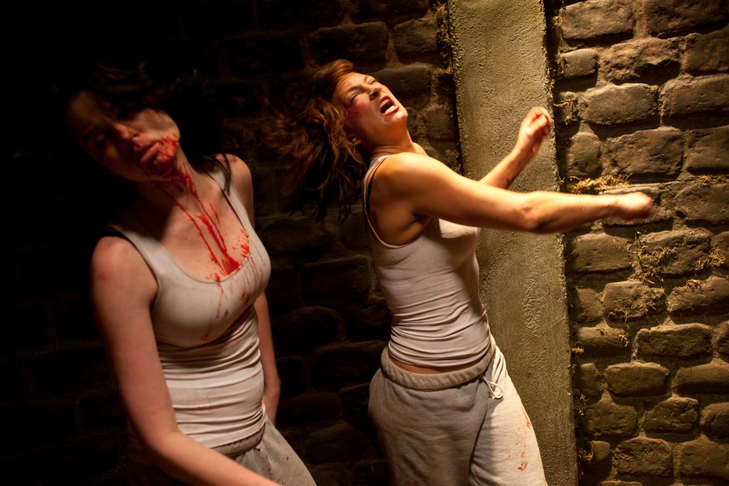 Bell (at right) dishes out some punishment.IFC Midnight