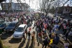 Celebrants gather in the parking lot of Garfield High School on Monday, Jan. before the annual Martin Luther King Jr. march to Westlake Park in downtown Seattle.