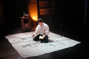 Toms' scientist surveys his plans.Chris Bennion