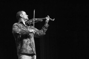 Geoffrey Castle Saturday, March 15 Watching someone play the violin might not