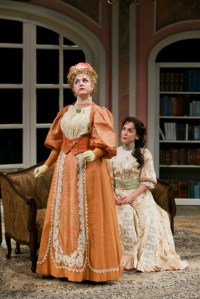 A harsh confrontation between Gwendolen and Cecily (Grogan and Lass).