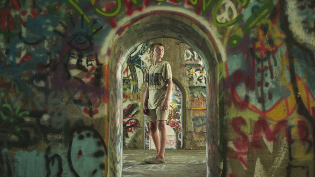 Jones as the impressionable young Tommy.