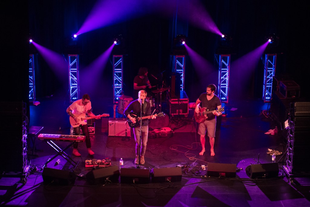 Benjamin Verdoes pulled me into the Historic Everett Theater with his dulcet tones and smooth voice.