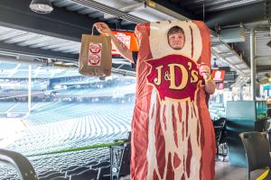 Ben Molinari dons a J&D's bacon suit.