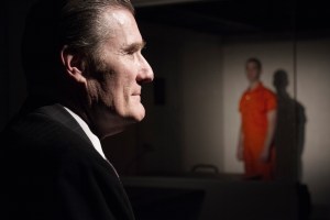 Newkirk's interviewer in foreground; Bergin's prisoner to the rear.Ian Johnston