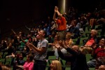 Soccer fans at the Seattle Public Library cheer for the winning second goal scored by the U.S team in the 86th-minute of the match.