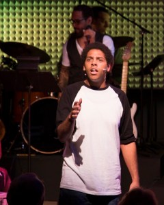 Andrew Lee Creech as the narrator's younger self, with Bell in background.Martin Christoffel