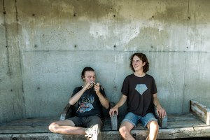 John Goodhue and Gabriel Seaver of WEEED light up.