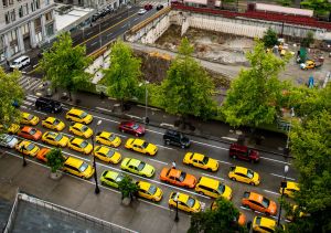 Drivers line the streets in front of City Hall in protest last summer. Photo by Tegra Nuess